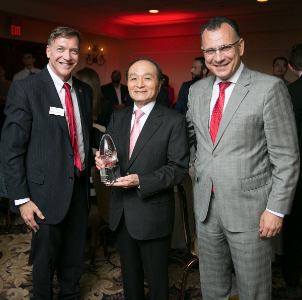 Stony Brook University President Samuel L. Stanley Jr., and Fotis Sotiropoulos, Dean of the College of Engineering and Applied Sciences, announce the induction of Myung Oh PhD, into the College of Engineering and Applied Sciences distinguished alumni Hall of Fame.